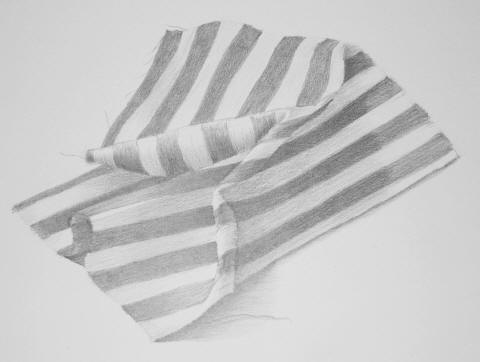 A shaded pencil drawing of a folded, striped cloth