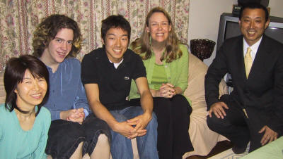 Aiko, Chris, Daigo, Deb and Daigo's father on a sofa