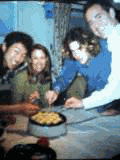 Daigo, Deb and Chris around a tako-yaki griddle