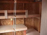 Built-in bunks and shelves inside the platform house